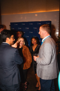 Participants engaging in conversations at the aad 2022 event.