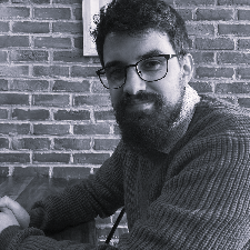 Smiling man named Dugi Surdulli
